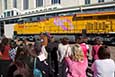 <a href="/newsinfo/graphics/media_kit/pinkribbon/pink_ribbon_03_hires.jpg">High-Res Version</a><br>A crowd welcomes the arrival of UP No. 7400
