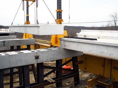 On April 17, 2009 at about 4 p.m., the last structural component of the new 2,800-foot long Boone High Bridge was set in place. The new bridge is 190-feet high and when it is open to rail traffic at the end of June, it will be one of the highest double-track railroad bridges in North America.